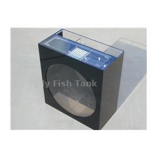 
<p>The 24&quot; Mini-Jelliquarium TANK-ONLY is our most compact and least expensive operational&nbsp;jellyfish display system. This Jelliquarium&nbsp;design has a Wet-Dry Trickle filter, and an optional venturi protien skimmer,&nbsp;integrated&nbsp;into its backside for compact and
 effective filtration.&nbsp;A separate&nbsp;Chiller and Chiller Pump Assembly are available for cold-water applications. This is the perfect choice for hobbyist preferring an entry-level jellyfish tank.&nbsp;</p>
<p>The Mini-Jelliquarium TANK-ONLY dimensions are 24&quot; Long by 12” Wide by 26”Tall. The tank background, front and sides are black acrylic. Porthole opening is 20.5 inches in diameter.&nbsp;&nbsp;</p>
<p>&nbsp;The Mini-Jelliquariums’ unique patent pending 20 gallon faceted tank-only design incorporates an entire 3 -in-1 filtration system built into the back of the aquarium. This system combines mechanical, chemical, wet-dry biological filter technology and an
 optional venturi driven protein skimmer into a compact area within the back of the Jelliquarium filter system.</p>
<p>&nbsp;</p>
<p>&nbsp;</p>
<p>The Mini-Jelliquarium’s large biological area and optional Clear-for-Life™ Venturi protein skimmer fits into the rear filter compartment which is incorporated into the aquariums overall dimensions. All acrylic material is domestic cast, all aquarium seams
 are chemically bonded together and all tanks incorporate a solid top panel, with cut-outs, for added structural support. The TANK-ONLY does not come with any lighting, although an optional ABS light hood, with or without, dual fluorescent fixtures and light
 bulbs or our new Color Changing LED lighting system is available. </p>
<p>The Mini-Jelliquarium DOES NOT include a refrigeration unit. An optional Chiller and Chiller Pump Assembly are available. This Chiller Pump Assembly is $62.00 and it&nbsp;consists of two bulkheads drilled and installed into the backside of the Mini Jelliquarium.
 A small additional&nbsp;submersible water pump is placed into the filter compartment and discharges water through one of the bulkheads out and to an external chiller unit. The chilled water returns through the second bulkhead back into the filter compartment. Midwater
 Systems can also offers the JBJ 1/10th HP Artica chiller for $700,&nbsp;which can sit alongside the Mini Jelliquarium ( see options ). This chiller runs silent, capable of maintaining&nbsp;60 degrees and is inconspicuolously attractive. This is a&nbsp;great combination for
 maintaining&nbsp;coldwater jellyfish species.&nbsp;&nbsp;</p>
<p></p>
<p>Cover the top of your Mini Jelliquarium with a matching black acrylic Canopy. This Canopy is hinged to the top of the tank and adds an additional 4.5 inches in height.</p>
<p></p>
