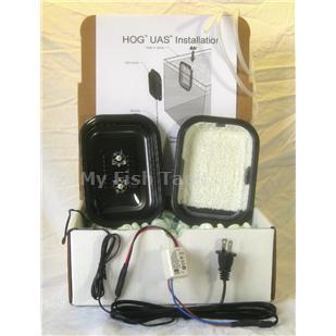 
<p>This HOG1 is a HOG Scrubber (tm) with over 24 square inches (150 square cm) of algal growth surface, which is designed to absorb the nutrients from this much feeding per day:&nbsp; 1 Frozen cube, or 10 Pinches of flake, or 10 Square inches (62 square cm) of nori,
 or 2.8 grams of pellets The number of gallons or liters of water in your tank or sump does not matter. If you feed more than the above amounts, you can get multiple HOG1 units; multiple units are preferred over one larger unit because you can clean one unit
 per week, and because youll always have one unit filtering while the other one starts growing again after a cleaning. Multiple units are also good for backup. The magnets attach the outside cover to the inside cover, through the aquarium wall, and can be used
 on glass or acrylic&nbsp;1/4 inch (6.25 mm) to 1/2 inch (12.5 mm). Not more. If your aquarium wall is 3/4&quot; (19mm) or bigger, then put the HOG1 on your sump instead; it will work the same. Or get the suction cup version; its not listed separately, so just order
 this magnet version and make a note that you want the suction cups instead. This is the first algae scrubber with Green Grabber&nbsp;(tm)&nbsp;growth surfaces. Green Grabber surfaces are so rough and prickly that they might be the roughest thing youve ever felt. A cactus
 might be sharper, but thats about it. Rough surfaces are critical for allowing algae to attach and grow and thus provide strong absorption of nutrients. The rock-hard protrusions stick straight out 1 to 3 mm. Conventional algae scrubber screens are made from
 &quot;slippery&quot; plastic canvas that is used for sewing and knitting; algae takes a long time to attach to it. Green Grabber (tm) growth surfaces are not plastic at all; instead they are rock hard and have jagged rough edges and points (dont let children play with
 them). Green Grabber surfaces are so good at grabbing algae and letting it grow that you may starting seeing tiny growth spots within hours, instead of days. And the white color of the Green Grabber surface reflects as much light as possible, getting almost
 the effectiveness of a 2-sided screen even though it really only has a light on one side of the surface. The ability of the Green Grabber surface to hold on to thick algal growth helps greatly when you are cultivating algae/seaweed to feed back to your livestock.
 As the growth gets thicker and longer, the rapid bubbles will try to pull the algae off of the surface; the super rough Green Grabber surface will allow the algae to stay attached until you are ready to feed the algae/seaweed to your animals. $149.99 USD (Use
 the shopping cart to tell you how much the shipping is, and be sure to click &quot;display rates&quot;. If you dont have a zip code, enter &quot;zip code&quot; instead. Note that shipping outside of the USA will probably require you to also pay an import charge when it arrives.
 We cannot mark it as &quot;gift&quot;. The lowest cost overseas shipping is generally USPS First Class Mail International. The size of the shipping box is 10 x 7 x 5 inches (25 x 17.5 x 10 cm). This is a hand-built Hang-On-Glass ® (HOG) Upflow Algae Scrubber ® (UAS)
 with a Green Grabber (tm)&nbsp;growth surface, magnet version, for glass or acrylic 1/4&quot; (6.25mm) to 1/2&quot; (12.5mm)&nbsp;thick. This is the typical thickness range for small and medium aquariums, and all sumps, however you should measure yours to be sure. If your glass
 or acrylic is thicker than 1/2 inch (6.25mm), you can request the suction-cup version instead when you order this magnet version. If your tank uses thin 1/8&quot; (3mm) glass such as many low-cost 10 gallon aquariums do, this filter is not recommended because the
 magnets are strong enough that they might crack the glass. You would be better off getting a lower cost HOG.5 filterIf your tank currently has very high nutrients, consider the stronger HOG1x&nbsp;No electrical parts go inside the aquarium; only air. And the air
 bubbler is already supplied (its sealed behind the growth surface), so you dont have to get an airstone. The bubbler is simply vinyl air hose that has been cut lengthwise, and with cross-cuts, to form little flexible segments that are both adjustable and open-able
 to allow for easy cleaning. This HOG1 will run on both 120V and 240V, and comes with a 10 ft (300 cm) power cord with a U.S. plug. If you require a different plug you can get an adapter at any local hardware or travel store, or online, or you can cut off the
 U.S. plug and install your own plug from a hardware store. Comes with 3 ft (90 cm) of vinyl airline, but requires an air pump that can pump at least 1.0 liters per minute (.04 cfm), which medium-cost air pumps can usually handle. Pumps that say they can handle
 2 or more airstones/outlets, or pumps with 2 tubing attachments instead of one, will usually be more than enough. You can have as much air as you like, however; 5 lpm pumps are no problem. One powerful pump which works exceptionally well for a low cost is
 the Fusion 700 from JW Pet. It is quiet and has two outputs which are adjustable by turning the control knob. Another even more powerful and completely silent pump, although more expensive and without a control, is the Whisper 300 from Tetra. With either pump
 you will need to combine the two outputs into one to feed the scrubber, using something such as the &quot;Tee&quot; air line tubing fitting from Tom. Make sure to put the air pump above the aquarium so that it will not drain any water if it shuts off. Comes with 2 red
 (660 nm) 3-watt LEDs, which are attached to a heat sink inside the cover; the cover gets warm on the outside. The LEDs will give the aquarium or sump a slight red color at night when the aquarium lights are off. You will need to get a timer so you can run
 the LEDs for up to 18 hours per day (not 24!). The LED never needs replacing. The HOG1 growth surface will need to be cleaned every 7 to 21 days, by removing the inside cover, disconnecting the airline, and taking the inside cover to the sink so you can brush
 the algae off of the growth surface and bubbler with a toothbrush. No hard scraping is needed; just brush it with a toothbrush. The Green Grabber growth surface is permanently glued to the inside cover using epoxy, however a few of the Green Grabber particles
 will dislodge during the first few cleanings, which is normal. Cleaning the growth surface, bubbler, and the inside cover takes about a minute with a toothbrush. The HOG1 comes with a 60 day warranty: Warranty is for replacement or repair only; not a refund.
 Costs for shipping back to us are covered if you are in the U.S. Costs for shipping back to us are not covered if you are not in the U.S., however we will pay for shipping back to you. In either case, you will need to ship the entire unit back to us before
 we can ship a replacement. Warranty is limited to repair or replacement, and does not cover fish loss, personal injury, property loss, or direct, incidental or consequential damage arising from the use of it. The warranty and remedies set forth above are exclusive
 and in lieu of all others, whether oral or written, express or implied. We specifically disclaim any and all implied warranties, including but not limited to lost profits, downtime, goodwill, damage to or replacement of other equipment and property, and any
 costs of recovering animals, plants, tanks or other aquarium related items and/or equipment. We are not responsible for special, incidental, or consequential damages resulting from any breach of warranty, or replacement of equipment or property, or any costs
 of recovering or reproducing any equipment, animals or plants used or grown with this product. Can be shipped to any country; you can find shipping costs by using the shopping cart;&nbsp;be sure to click &quot;display rates&quot;. If you dont have a zip code, enter &quot;zip
 code&quot; instead.&nbsp;Note that shipping outside of the USA will probably require you to also pay an import charge when it arrives. We cannot mark it as &quot;gift&quot;.&nbsp;The lowest cost (but slowest) foreign shipping is generally USPS First Class Package International, but
 USPS Priority Mail International is better because it is faster and has insurance.&nbsp;The size of the shipping box is 10 x 7 x 5 inches, 25 x 17.5 x 10 cm). This is the first Green Grabber (tm) algae scrubber available, and will be undergoing changes as improvements
 are found. HOG1 size: Each cover is 5&quot; wide x 6 5/8&quot; high x 1&quot; thick &nbsp;(12.7cm wide x 16.8cm high x 2.5cm thick). It requires at least 5&quot; (12.5cm) of water to operate in. The size of the suction cup version is the same as the HOG.5 suction cup version.
</p>
